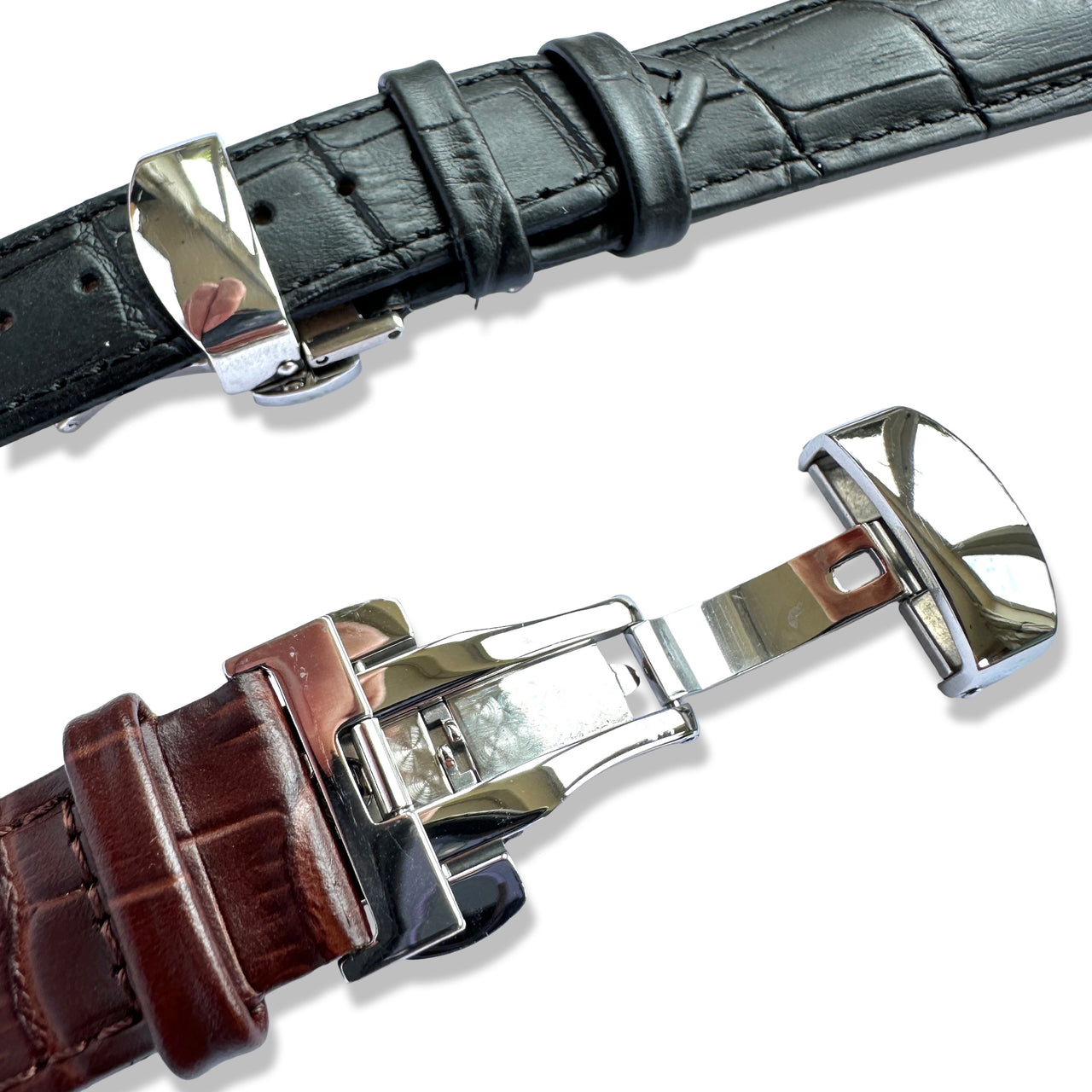 Two watch straps with silver buckles on a white background