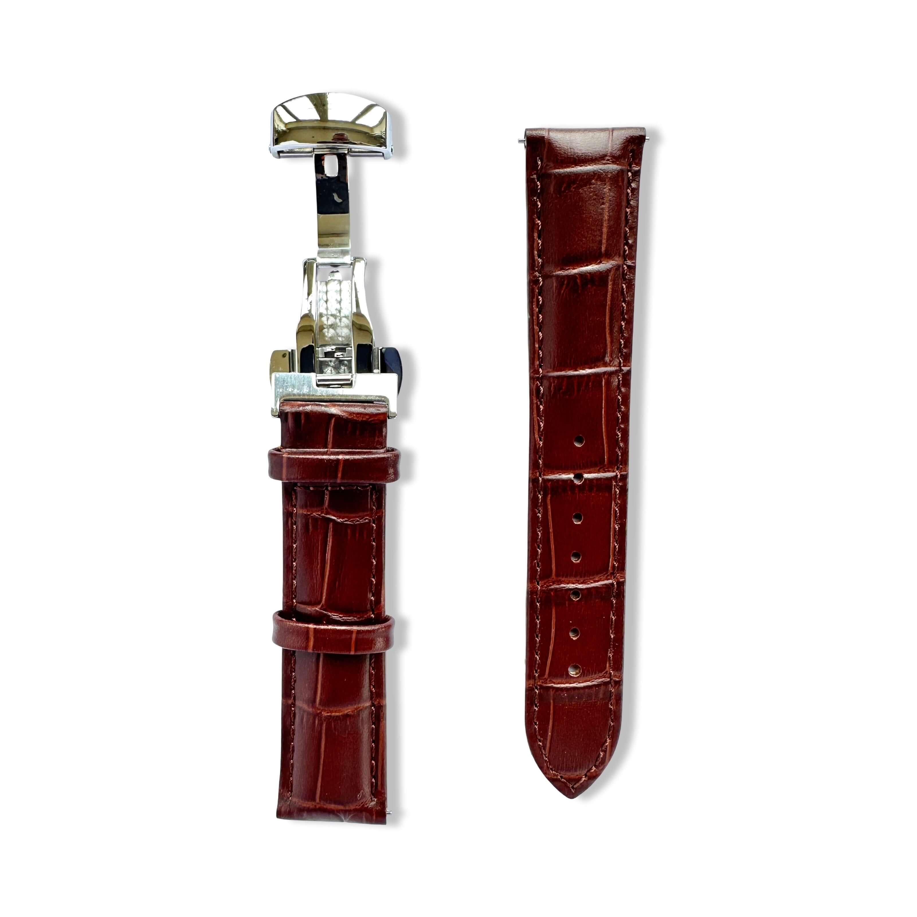 Brown leather watch strap with silver clasp on a white background